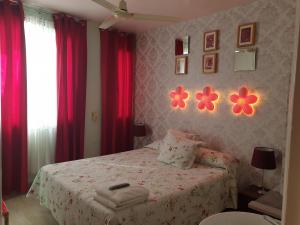 A bed or beds in a room at Casa de Huespedes Dolce Vita