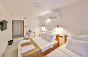 Säng eller sängar i ett rum på Zinbad Hotel Kalkan