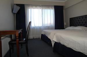 Cama o camas de una habitación en Hotel Econohotel