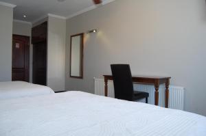 Letto o letti in una camera di Hotel Econohotel
