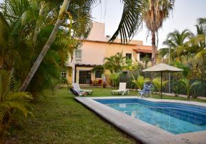 Bazén v ubytování Cancun-Soho nebo v jeho okolí