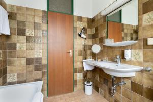 Koupelna v ubytování Hotel Kolbergarten