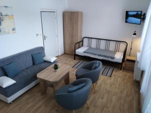 Postel nebo postele na pokoji v ubytování Apartmán U Dubu