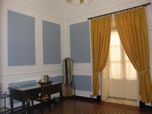 A seating area at Il Gattopardo House