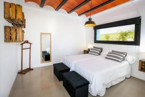 Postel nebo postele na pokoji v ubytování Villa Guadiana Golf + 30 fotografií