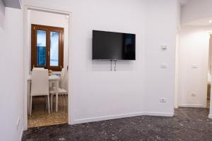 A television and/or entertainment centre at The Heart of San Marco - WiFi
