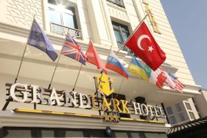 a group of flags on the front of a building at Otel Grand Lark İstanbul in Istanbul