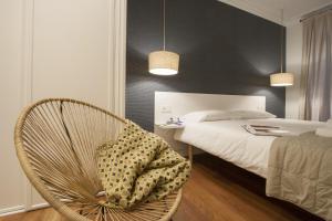 A bed or beds in a room at Bare by Oldtown SS Apartments