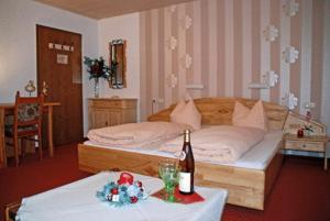 Postel nebo postele na pokoji v ubytování Alpenchalet Bianca