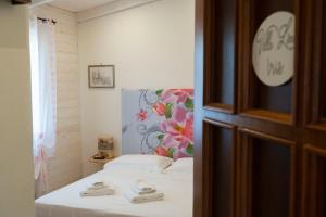 Кровать или кровати в номере Villa Lina Bed&Breakfast