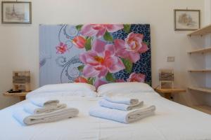 Кровать или кровати в номере Villa Lina Bed&Breakfast