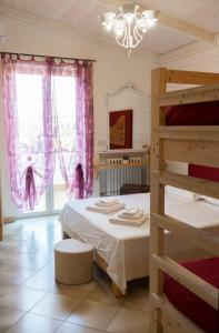 Кровать или кровати в номере Villa Lina Bed&Breakfast