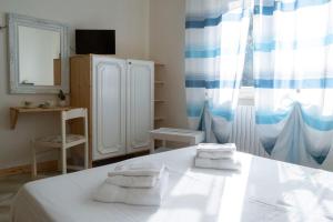 Кровать или кровати в номере Villa Lina Bed&Breakfast