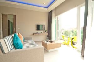 Χώρος καθιστικού στο Ratana Platinum Resort Kamala