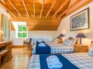 Ένα ή περισσότερα κρεβάτια σε δωμάτιο στο Townfoot Cottage