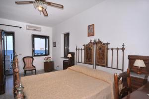 Cama ou camas em um quarto em Hotel Villaggio Stromboli - isola di Stromboli
