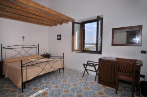 Cama ou camas em um quarto em Hotel Villaggio Stromboli - isola di Stromboli