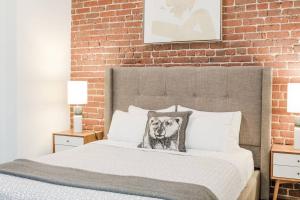 Ένα ή περισσότερα κρεβάτια σε δωμάτιο στο Abode Los Angeles - Downtown Historic Core