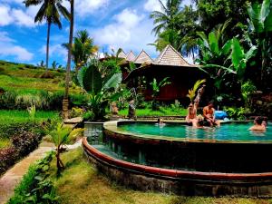 The swimming pool at or close to Junjungan Suite