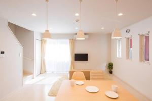 TV a/nebo společenská místnost v ubytování 雲 - Family House KUMO -