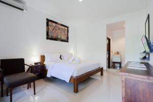 WIRA Homestay & Spa客房内的一张或多张床位