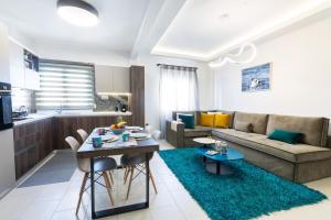 A seating area at Sleeping Beauty Apartment City Center!!