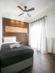 A bed or beds in a room at Sleeping Beauty Apartment City Center!!