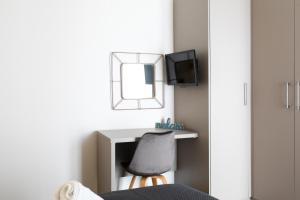 A television and/or entertainment centre at Sleeping Beauty Apartment City Center!!