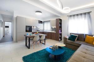 A seating area at Sleeping Beauty Apartment City Center!!