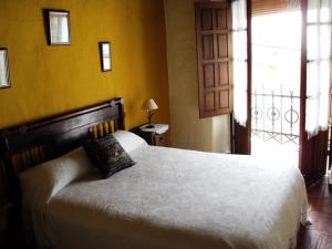 Posteľ alebo postele v izbe v ubytovaní Casa Antoñita