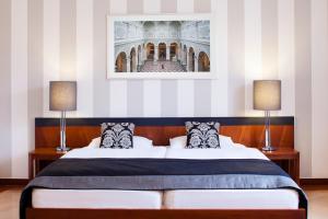 Posteľ alebo postele v izbe v ubytovaní Hapimag Resort Budapest