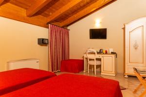 Posteľ alebo postele v izbe v ubytovaní Agriturismo dei Grippi