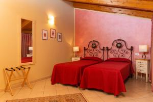 Posteľ alebo postele v izbe v ubytovaní Agriturismo dei Grippi