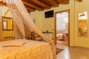 Posteľ alebo postele v izbe v ubytovaní Agriturismo dei Grippi
