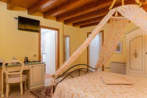 Posteľ alebo postele v izbe v ubytovaní Agriturismo dei Grippi
