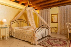 Posteľ alebo postele v izbe v ubytovaní Agriturismo dei Grippi