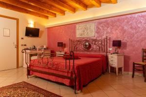 Posteľ alebo postele v izbe v ubytovaní Agriturismo dei Grippi