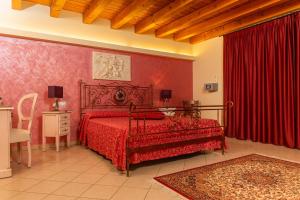 Posteľ alebo postele v izbe v ubytovaní Agriturismo dei Grippi