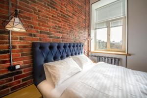 Postel nebo postele na pokoji v ubytování Secret Apartments