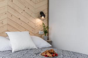 Posteľ alebo postele v izbe v ubytovaní Apartamenty Smrekowa Turnia