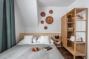 Posteľ alebo postele v izbe v ubytovaní Apartamenty Smrekowa Turnia