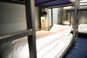 Tempat tidur dalam kamar di Kabannas London St Pancras