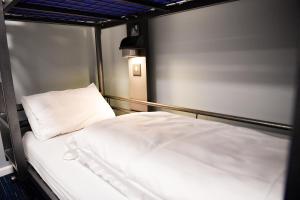 a bed in a hotel room at YHA London St Pancras in London