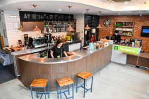 a restaurant with a lot of tables and chairs at YHA London St Pancras in London