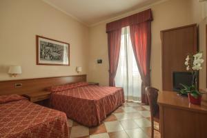 Postelja oz. postelje v sobi nastanitve Hotel RomAntica + 23 fotografij