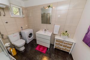 Kúpeľňa v ubytovaní Villa Luana