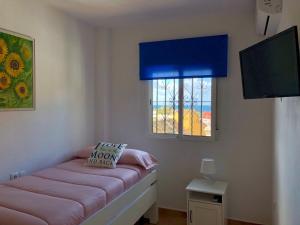 Postel nebo postele na pokoji v ubytování Apartamento Triana II Bolonia, Tarifa