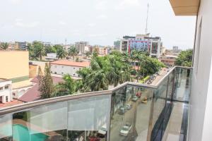 a view of a city from the balcony of a building at IMD Residence in Douala