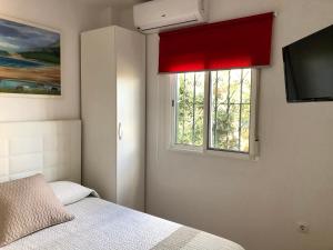 Postel nebo postele na pokoji v ubytování Apartamento Triana II Bolonia, Tarifa