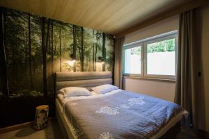 Posteľ alebo postele v izbe v ubytovaní Apartament Słoneczna Góra 1 z biokominkiem - Dream Apart
